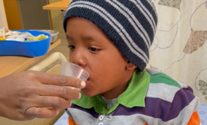 Photo caption: Chad, 5 years old, living with HIV and diagnosed with MDR-TB, is receiving the new child-friendly formulation treatment for DR-TB, as part of the CATALYST study. Photo credit: Stellenbosch University/Unitaid.